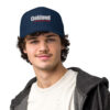 A man wearing a hat with oakland on it.
