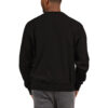 A man wearing a black sweatshirt with a logo on the back.